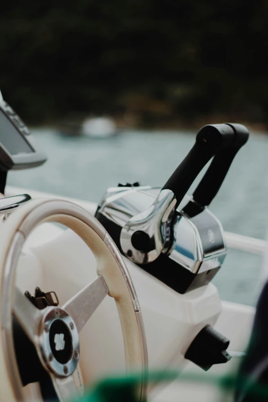 the steering wheel and instrument on a boat