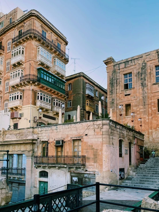 the facade of this old building is broken down