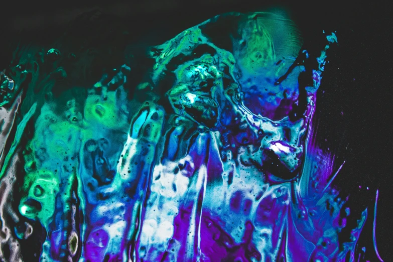 abstract artwork created with fluid colors that are colorful and different