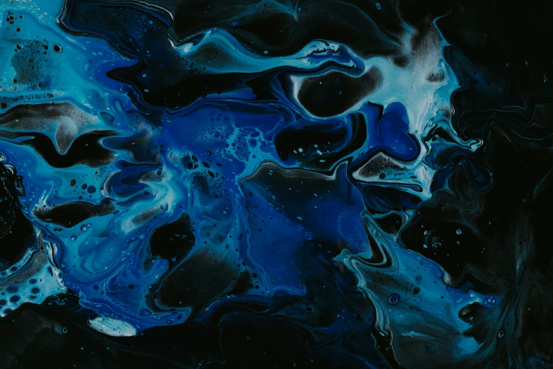 a large abstract blue painting on black and white