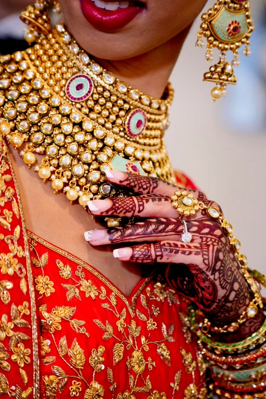 an indian bride with jewelry on her face