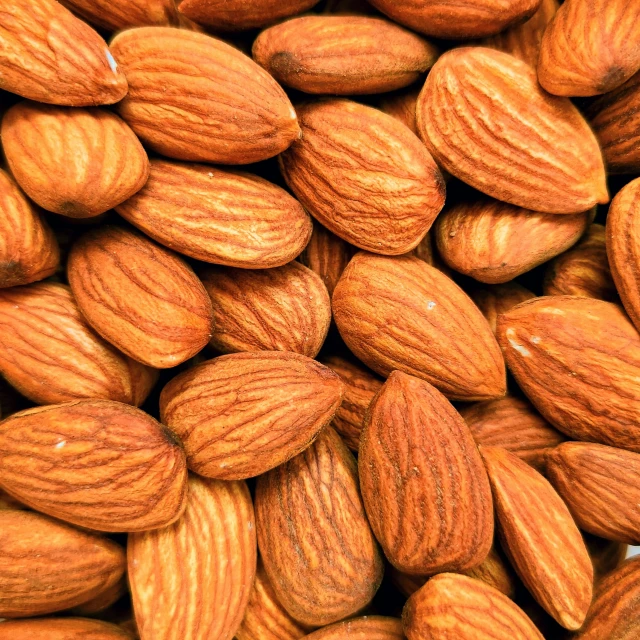 several nuts are stacked high in the air