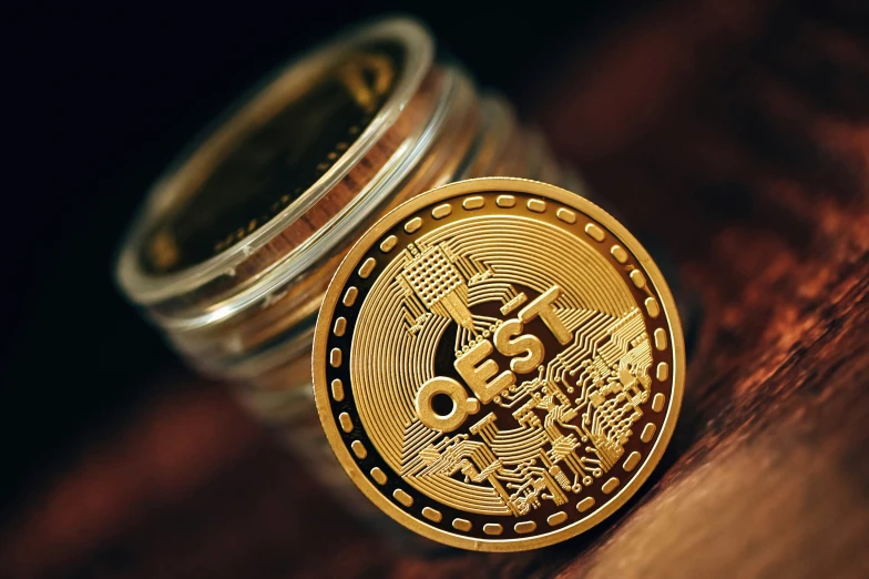 a gold coin in front of two empty glass jars