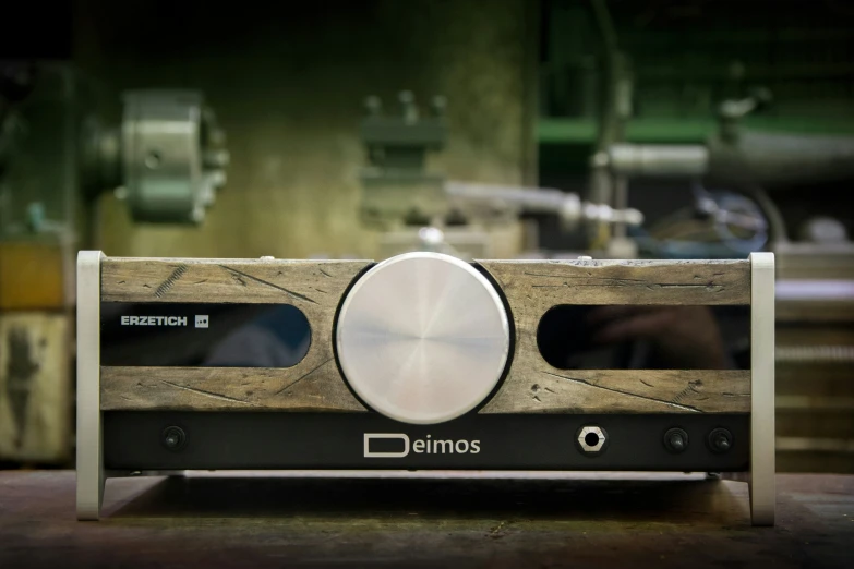 a wooden stereo in a large industrial setting
