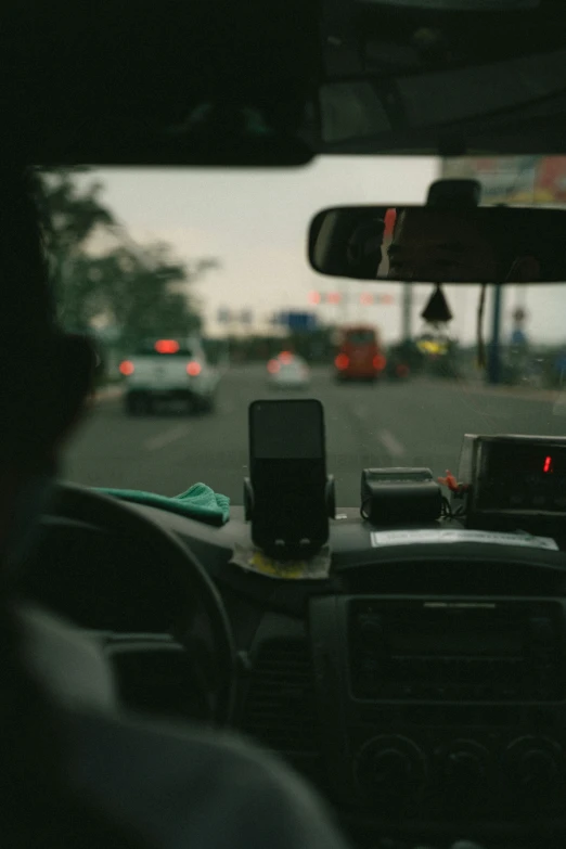 the interior of a car, with dash light in view