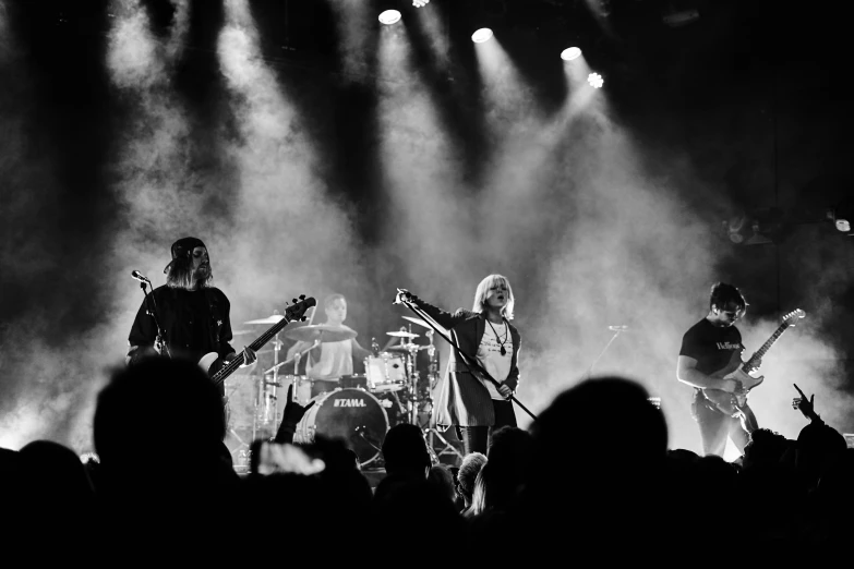 the band black label perform onstage in front of fans