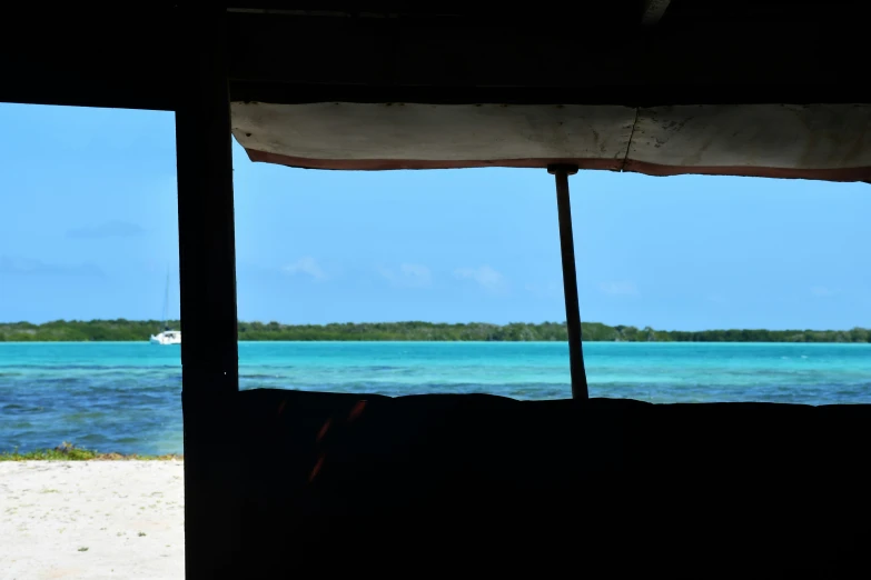 view from a boat on an island over a bay