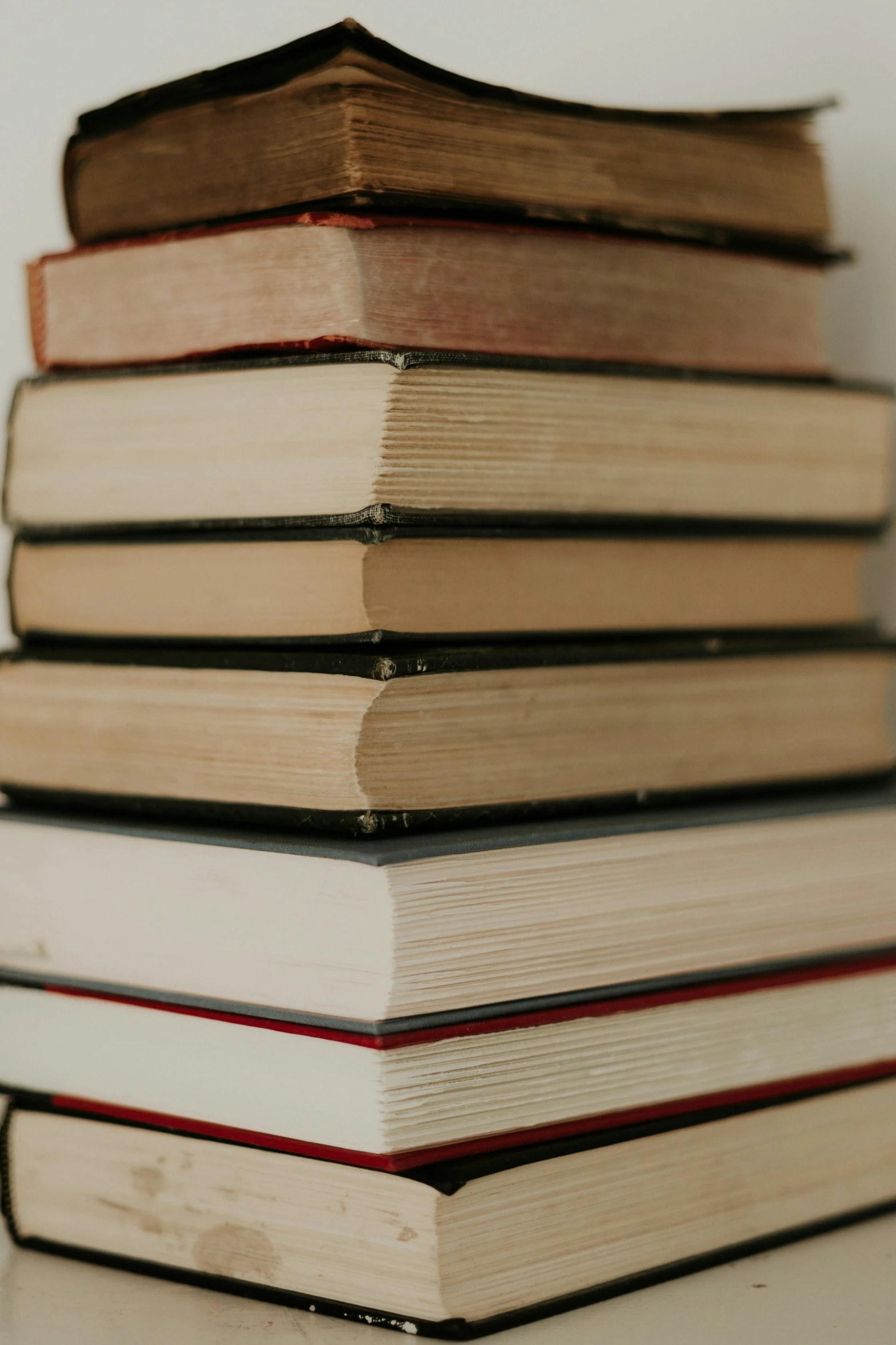 there is a stack of books on the table