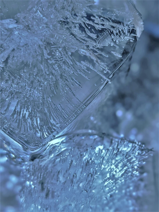 a glass container is shown with water on it