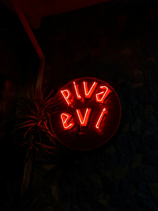 an illuminated sign saying give avs on the wall