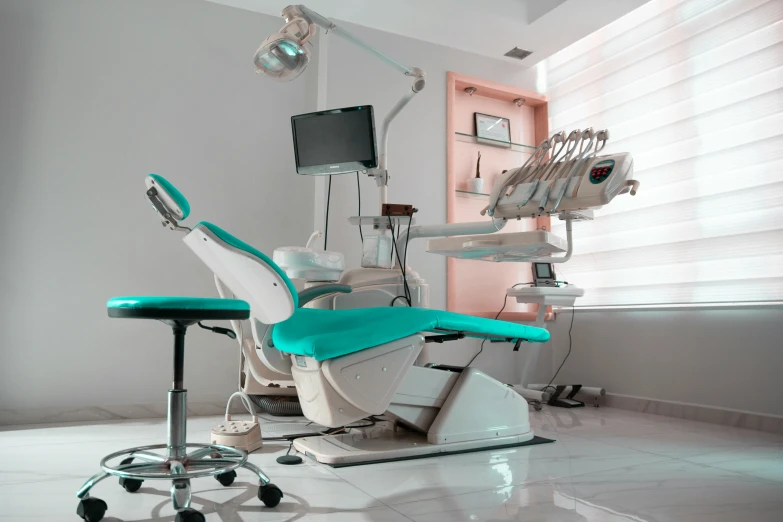 this dentist chair is equipped with different dental equipment