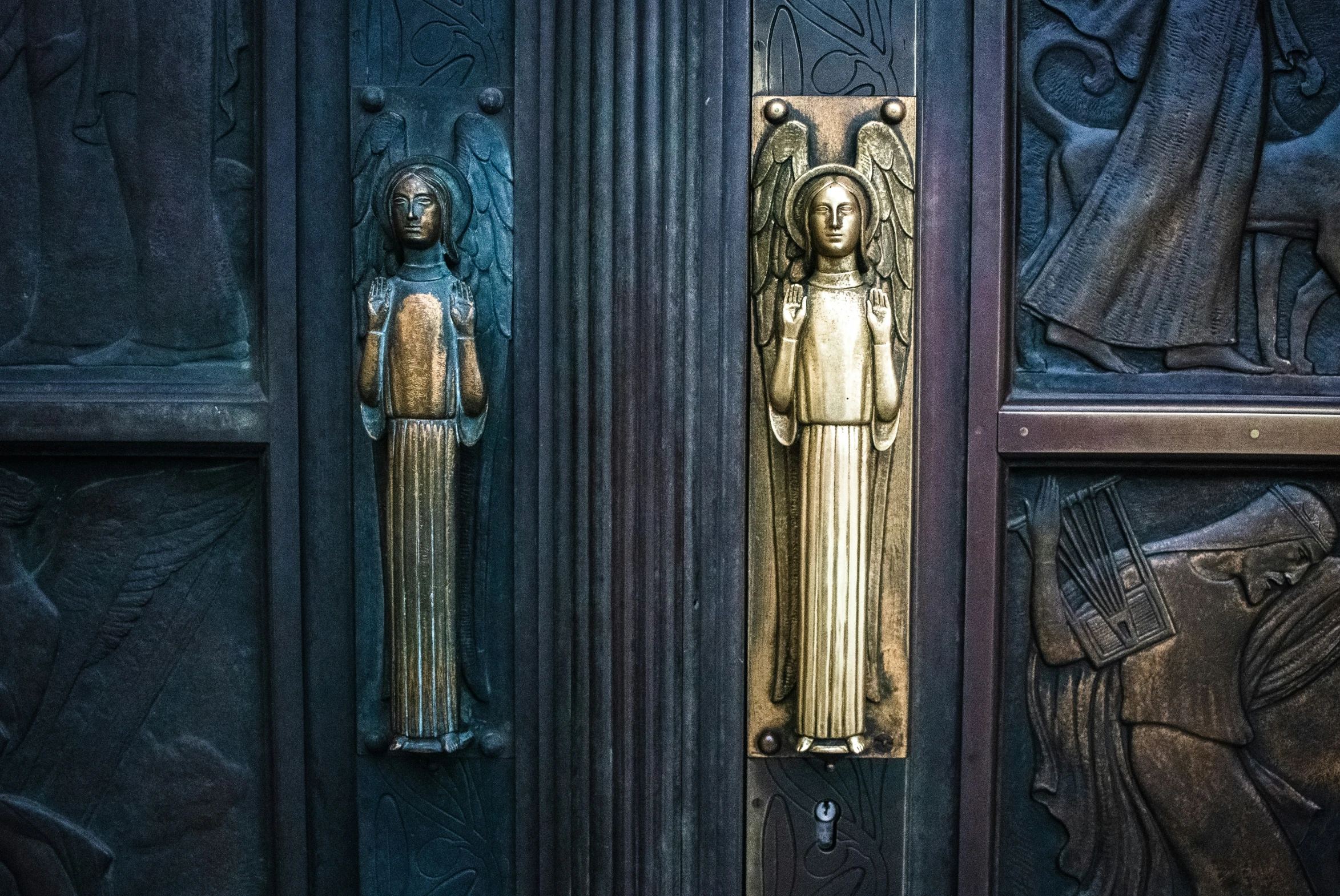 a door handle is pictured next to a door