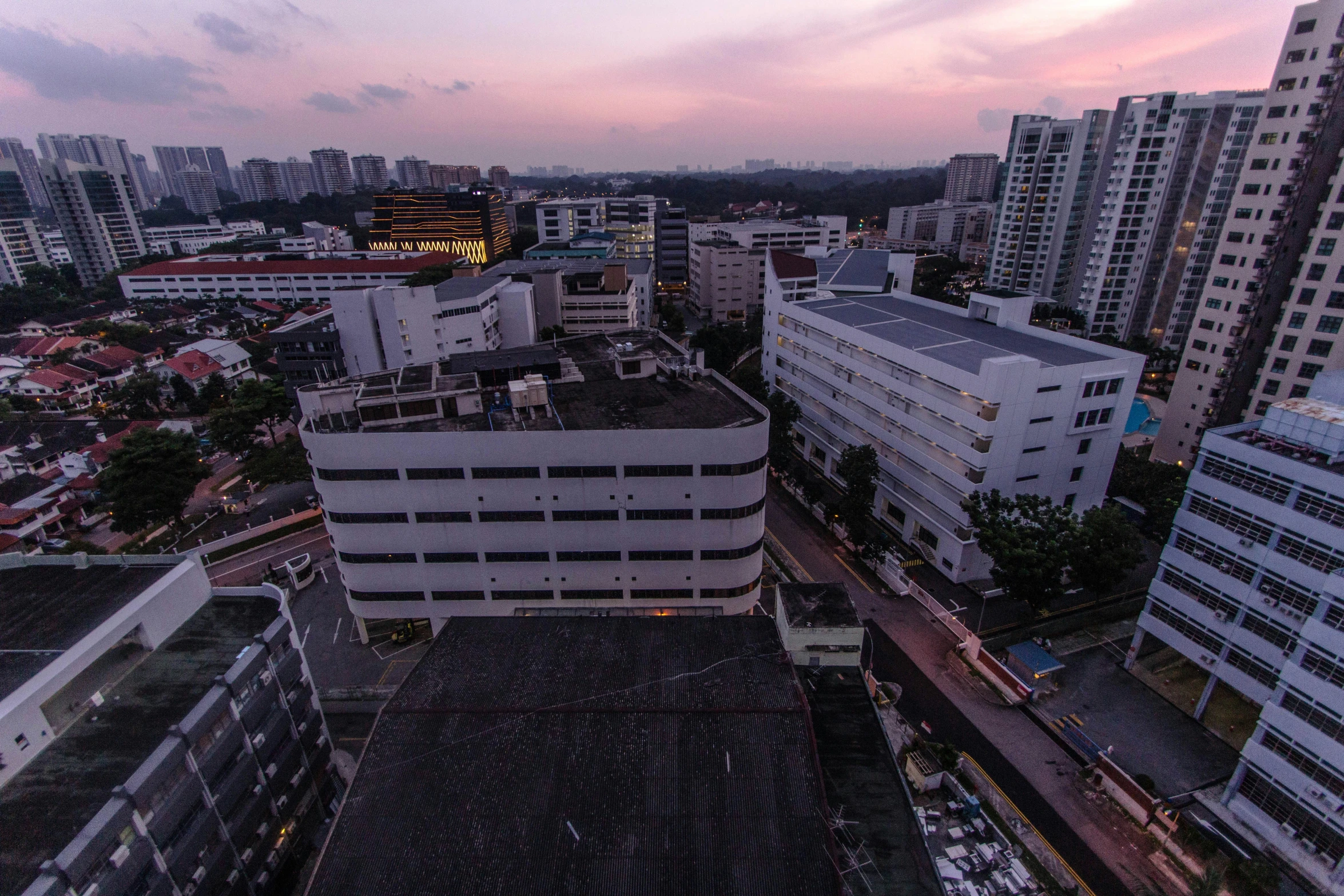 cityscape looking up at buildings and a roof