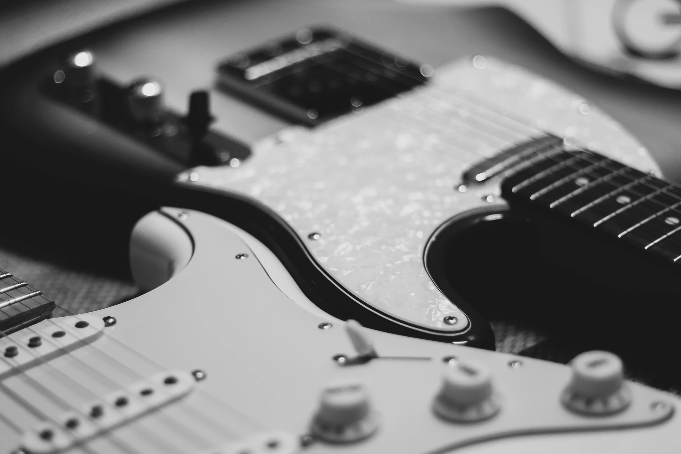 electric guitars lined up in a row together