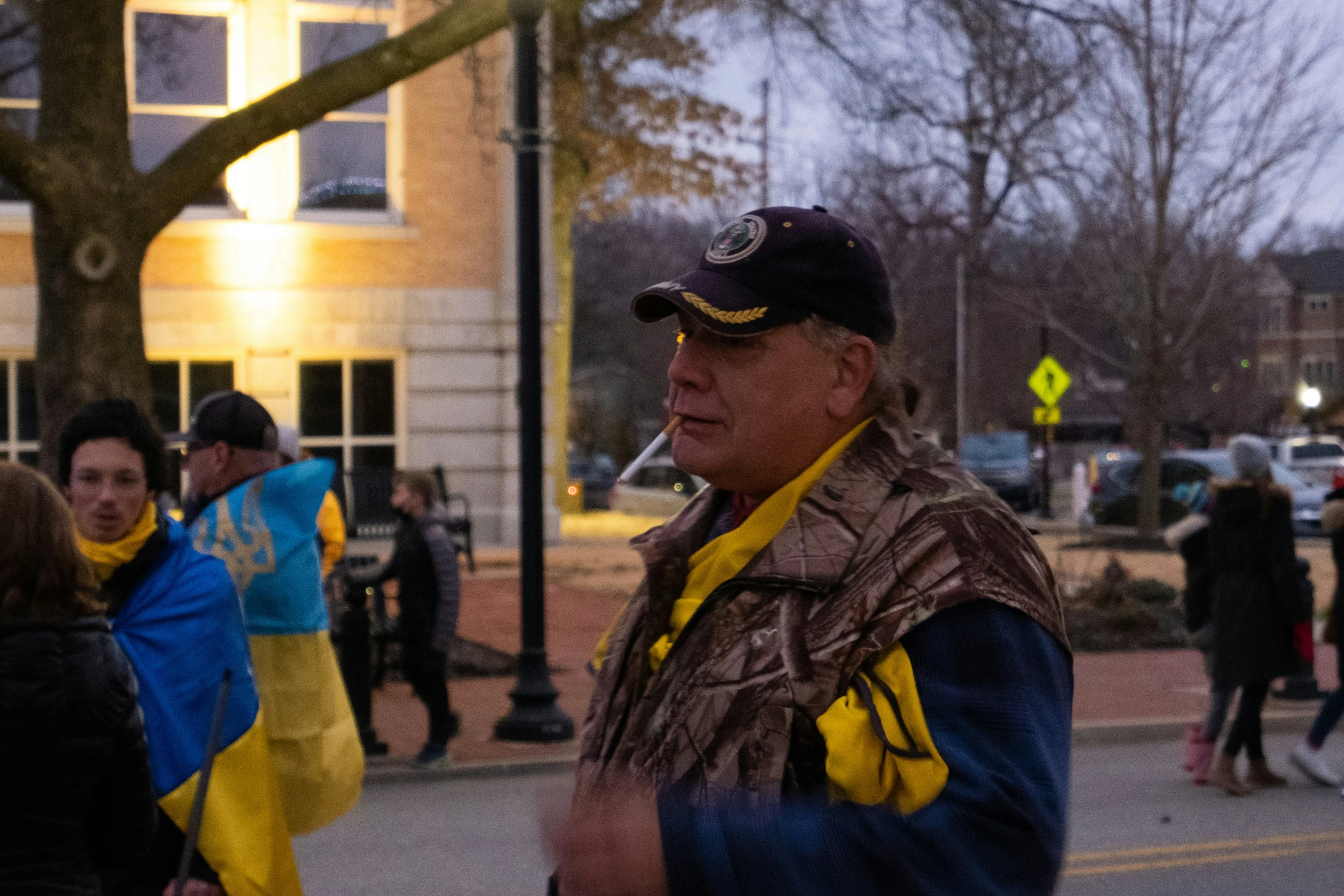 a man in a costume on a city street