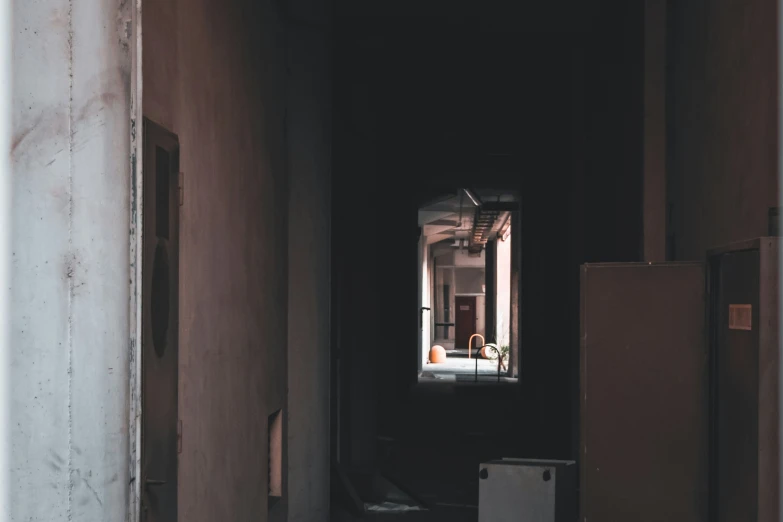 an exit way with boxes on the floor