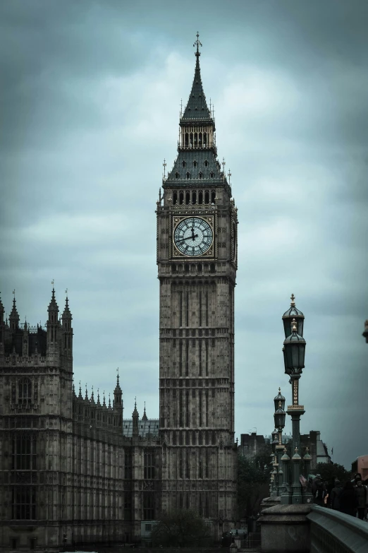 an elaborate tower with a clock is shown in the background