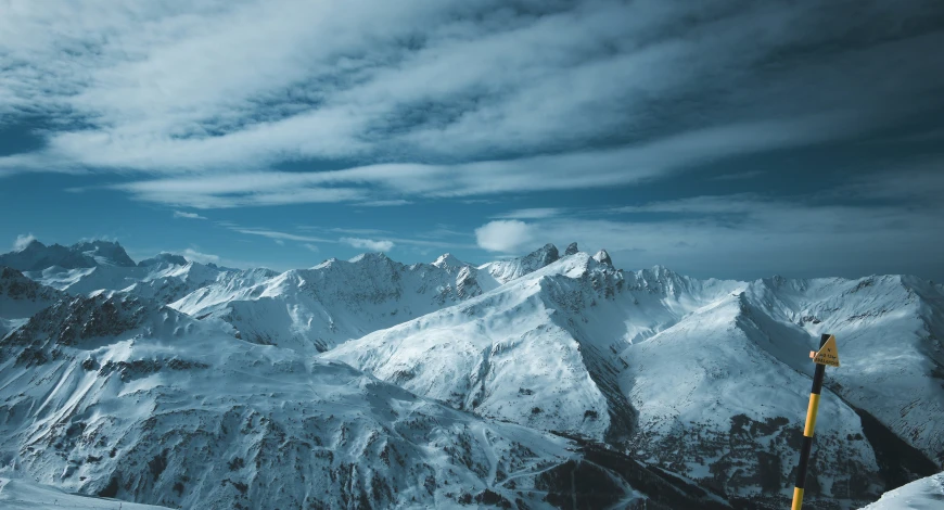 a view of the top of a snowy mountain