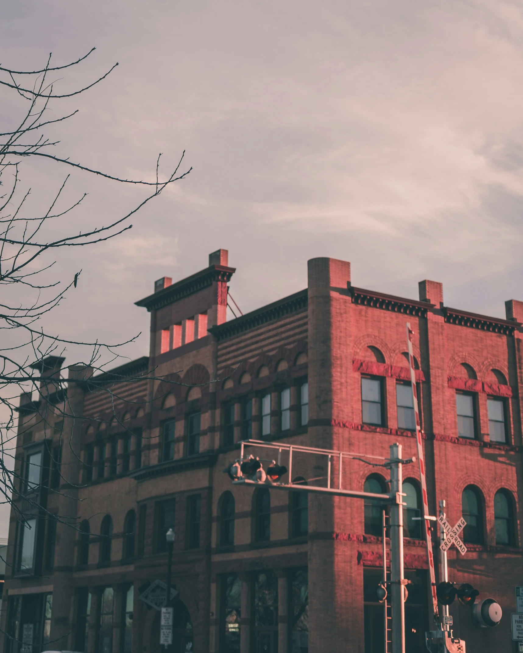 red brick building with a basketball goal on it