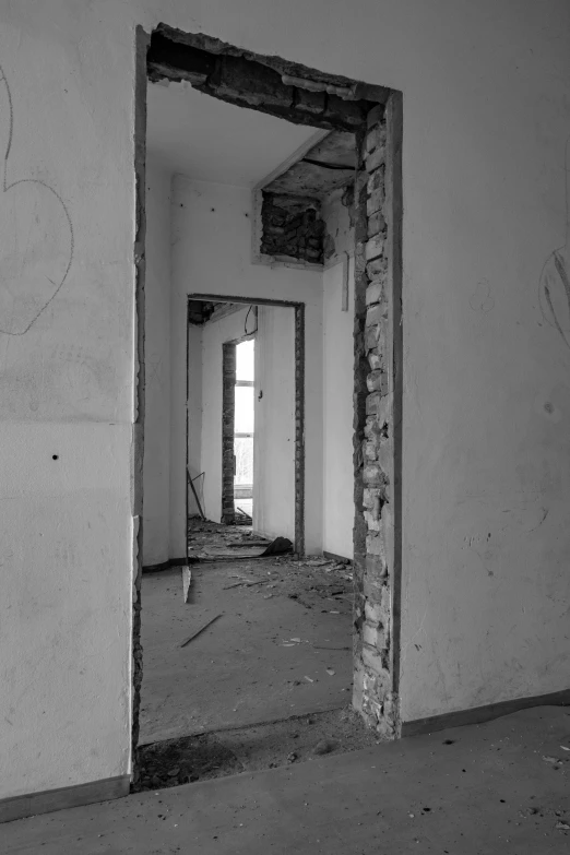 an empty hallway with no door yet in the wall