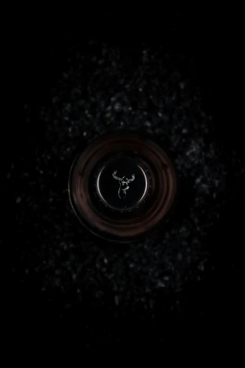 a close up of the base of a black object