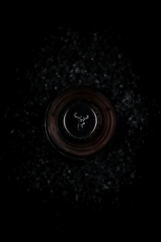 a close up of the base of a black object