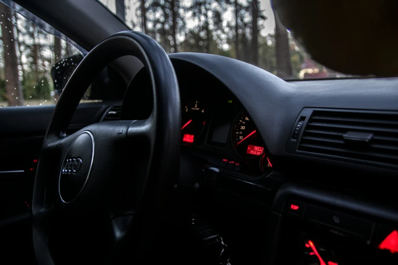 an interior view of a car driving on the road