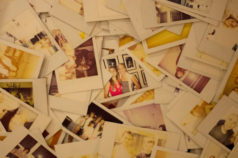 several polaroid pographs placed together in the shape of a heart