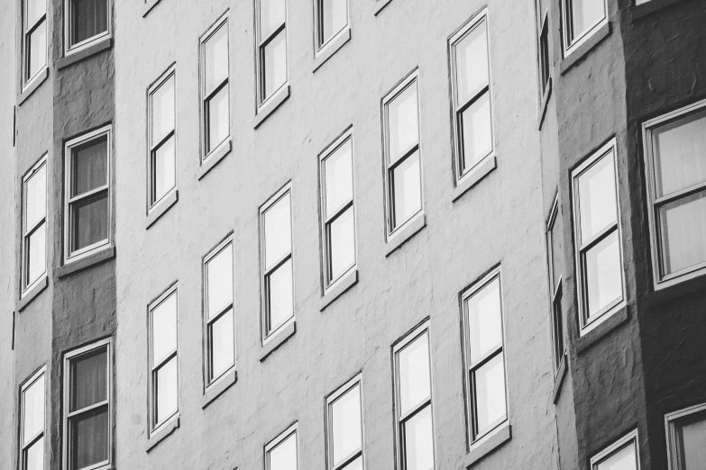 a black and white image of a big building