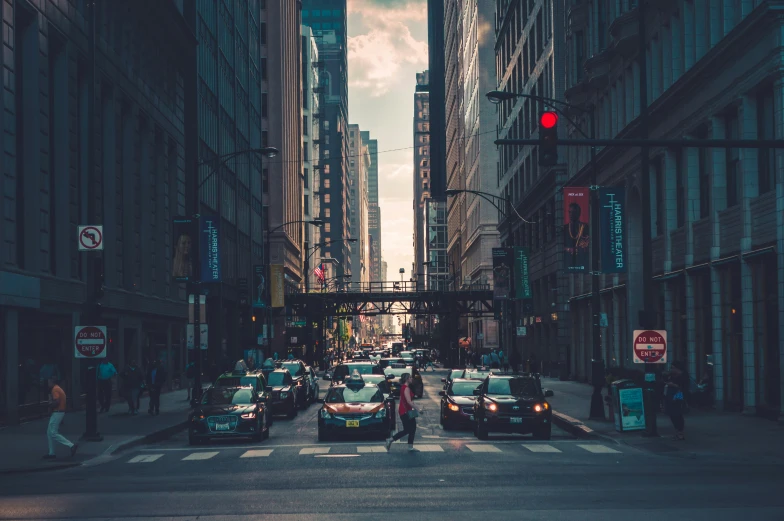 a group of cars parked next to each other in front of buildings