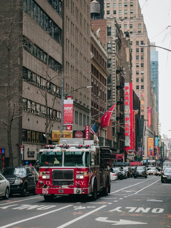 the fire engine is stopped at an intersection for traffic