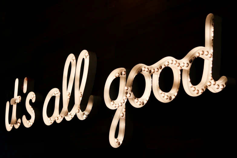 it's all good sign lit up in the dark