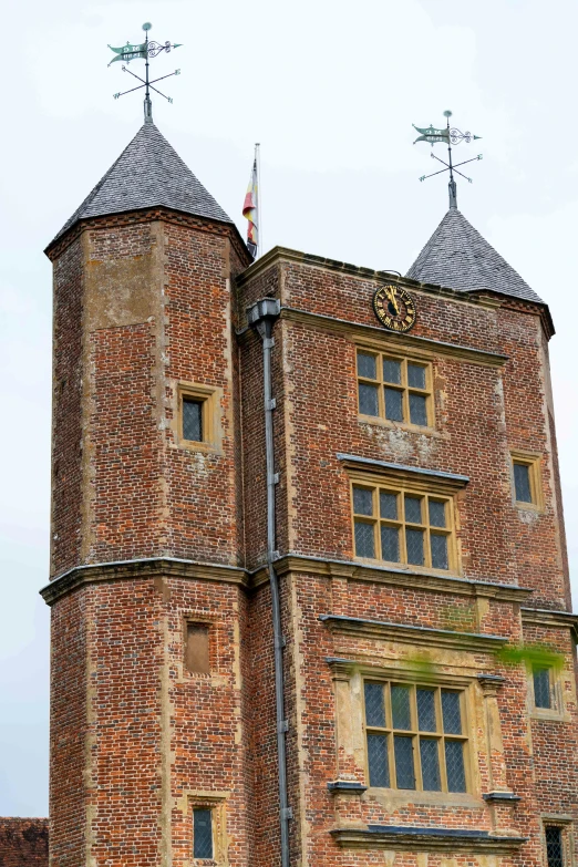 two tower styles with wind vane designs on the top