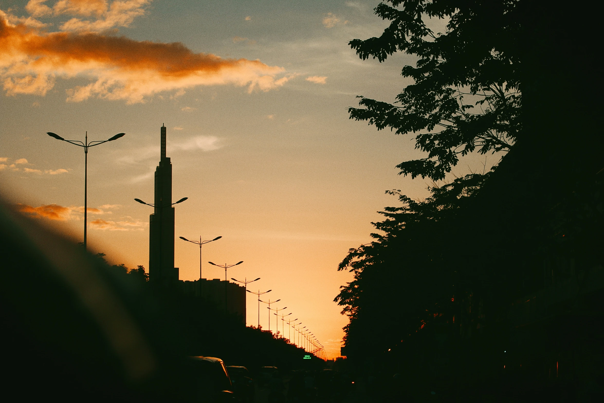 a street that has some very tall buildings