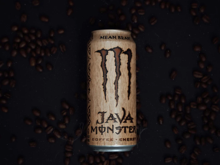 a can of coffee beans with a monster logo on it