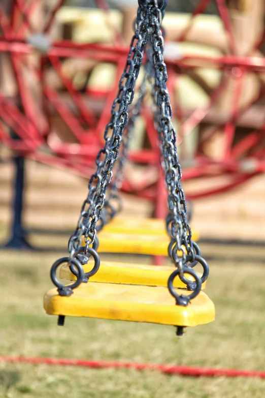 this is a childrens swing set with chains and wheels