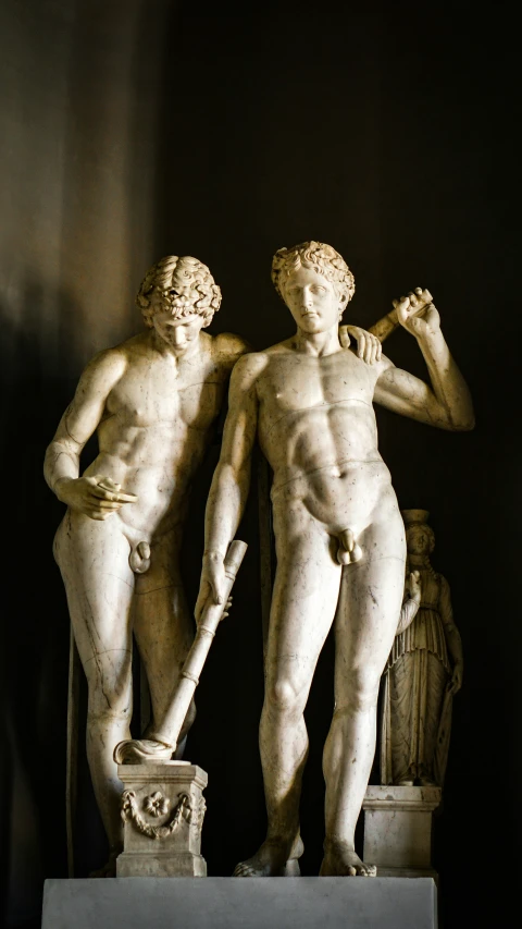 a statue with two men standing in it