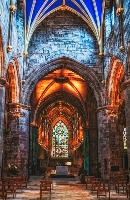 a large cathedral with a big window is shown