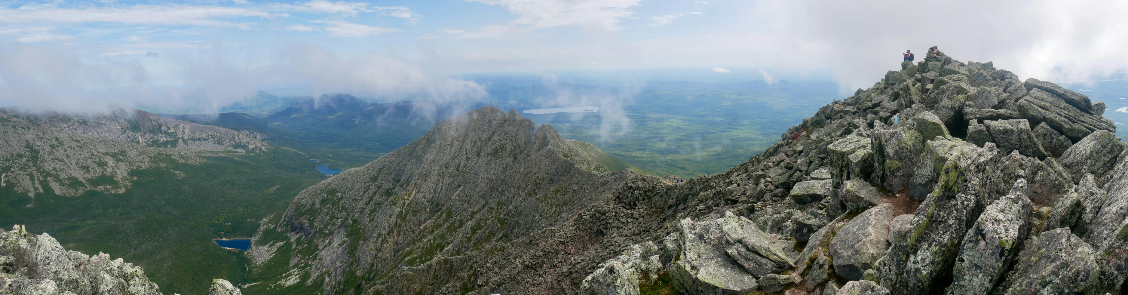 some very big mountains on a sunny day