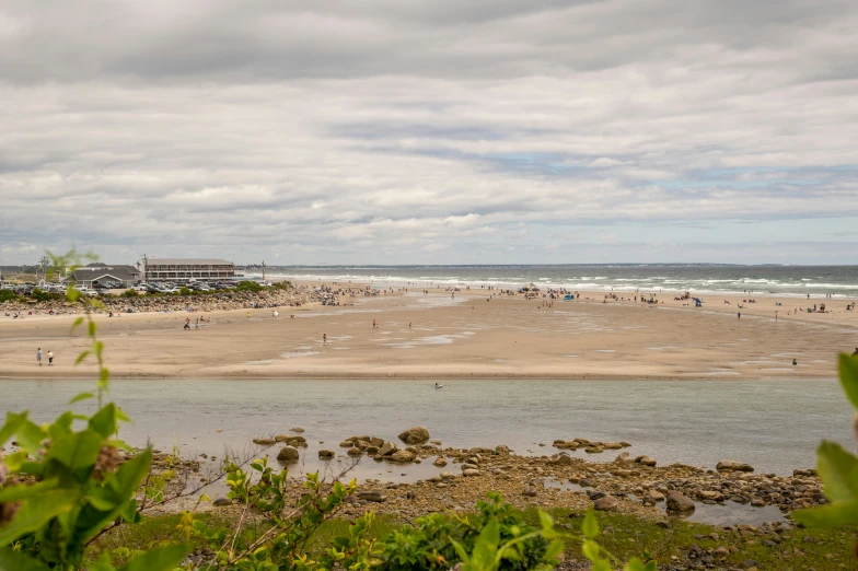 there is a beach with people on it