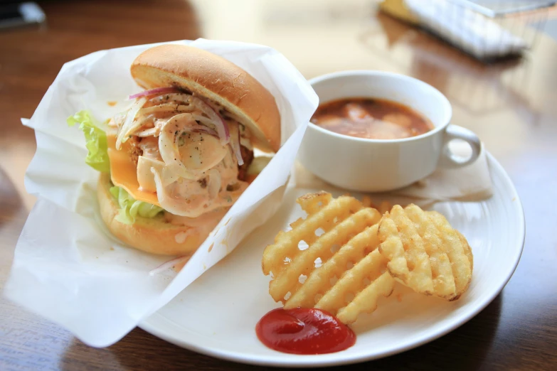 a plate that has food and a cup on it