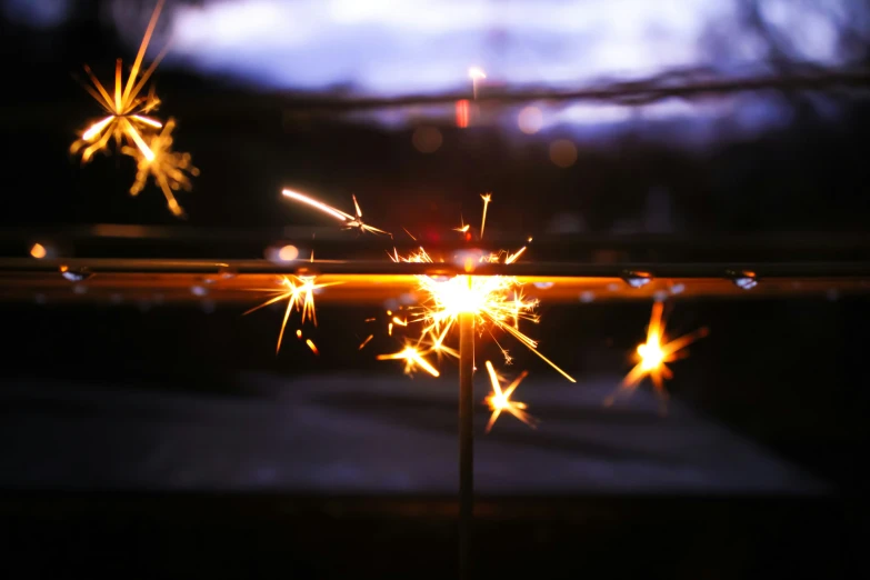 a picture of a lighted candle on a stick