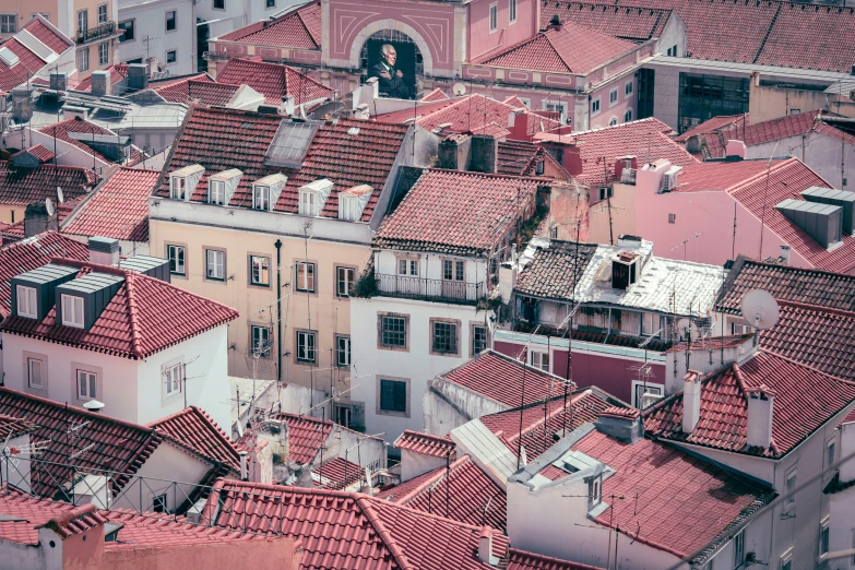 this po shows the roofs and windows in a city