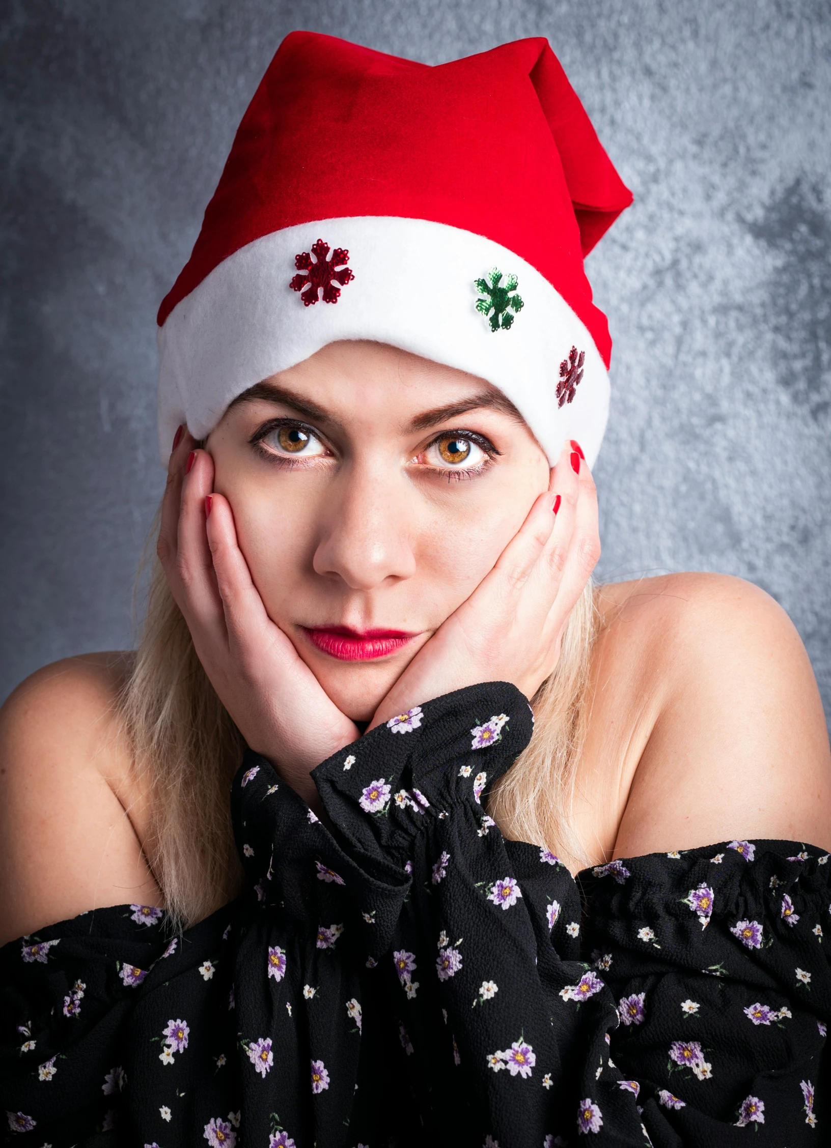 young woman wearing a red and white christmas hat