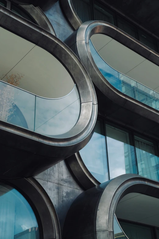 round mirrors in the center of a black building