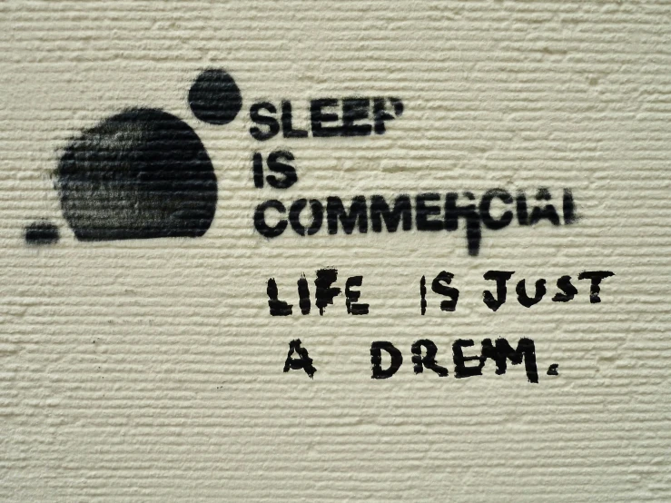 graffiti reading, sleep is commegquiin life is just a dream