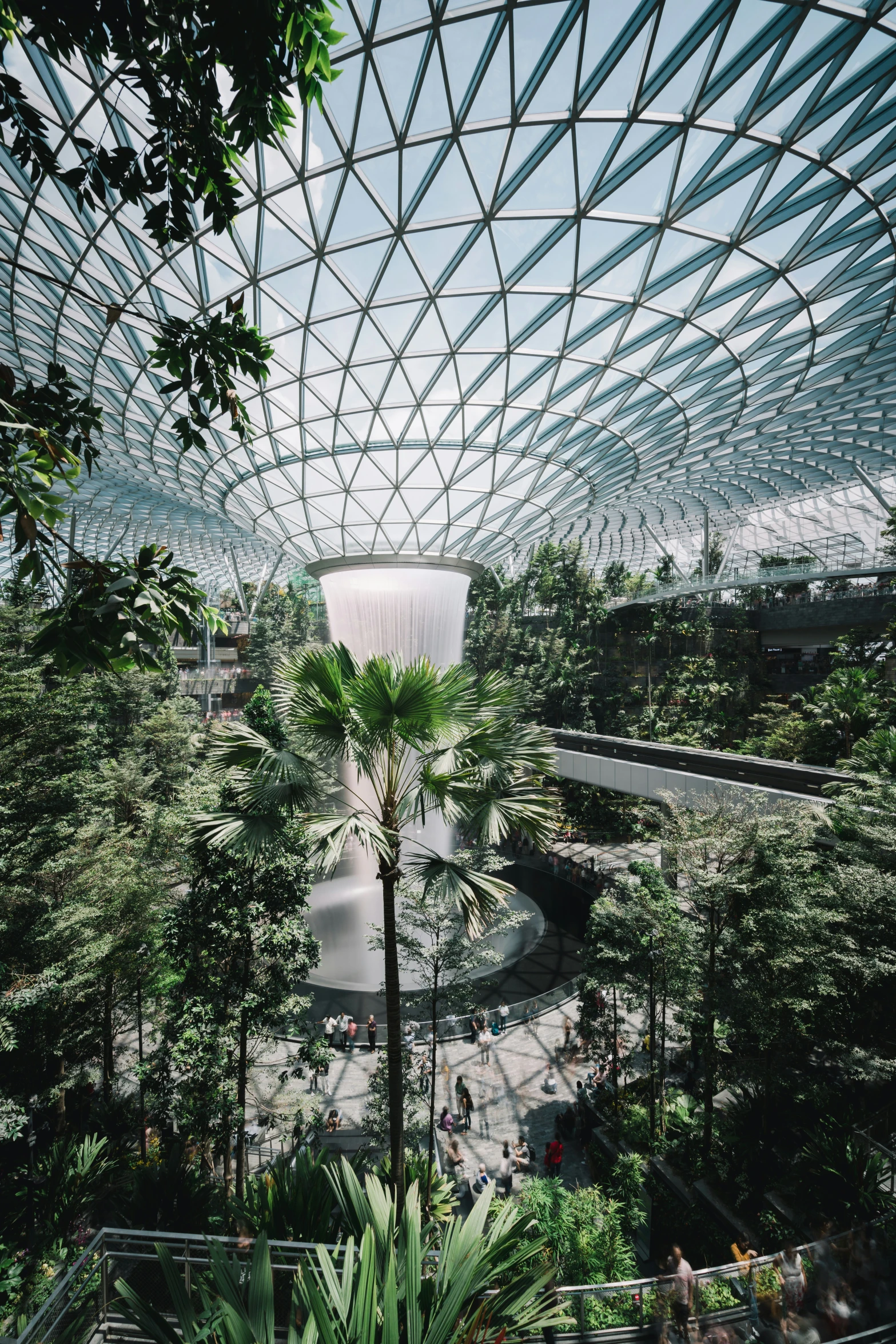 inside of a large building with a sky tunnel in it