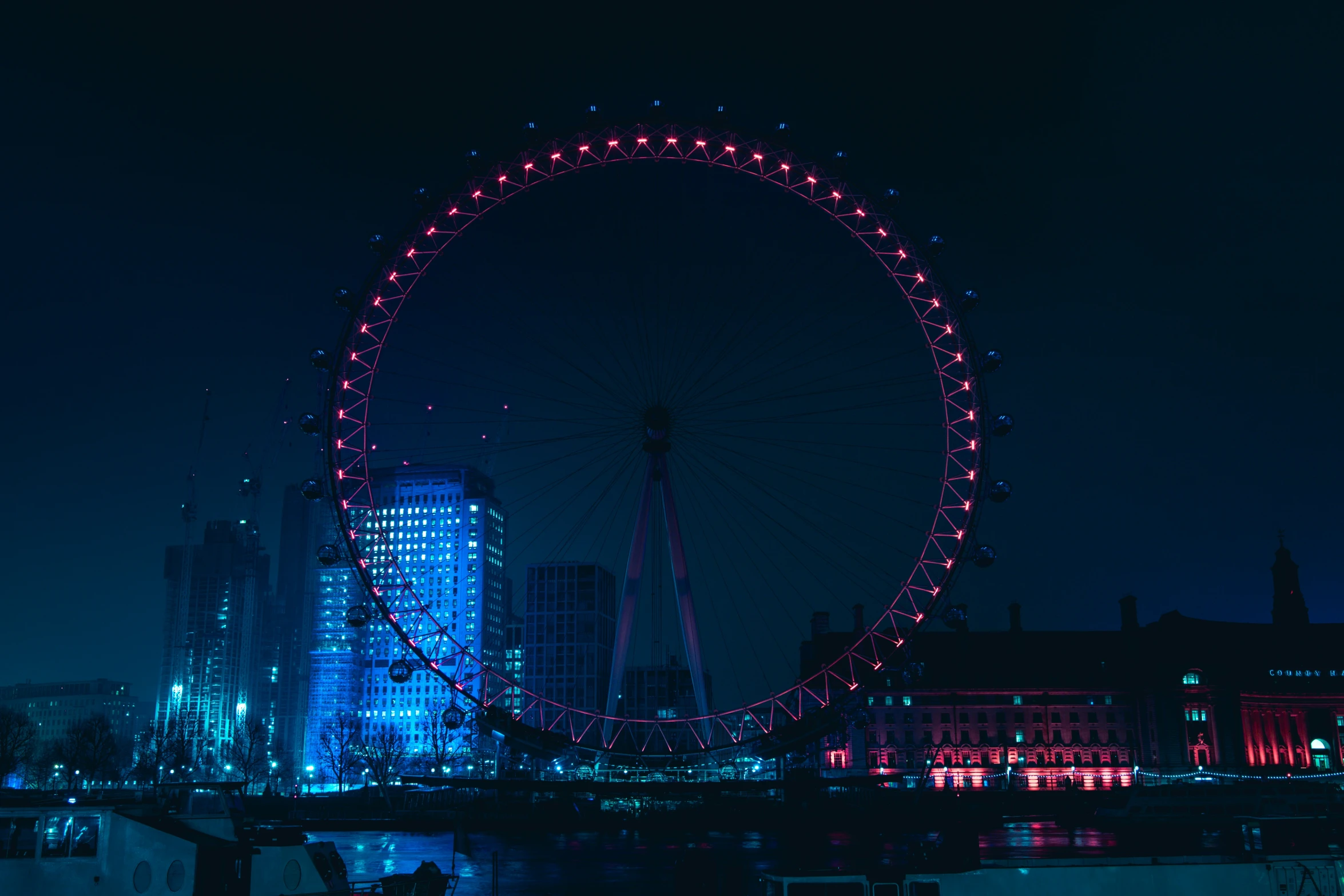 a very large ferris wheel in the city