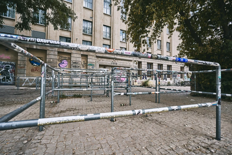 an old volleyball court sits empty on a city street