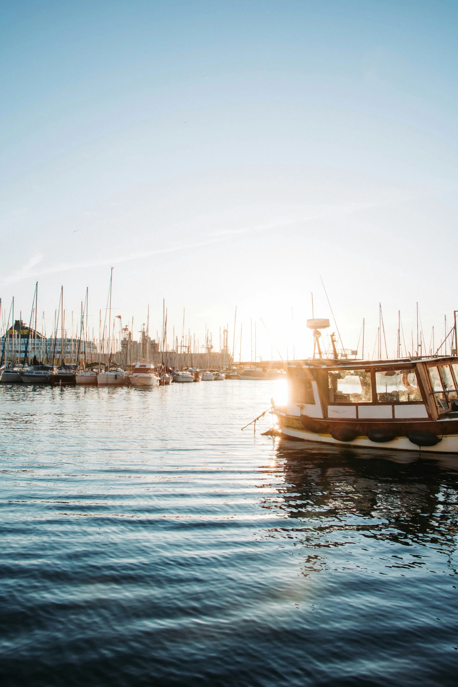 there are several boats that are docked in the water